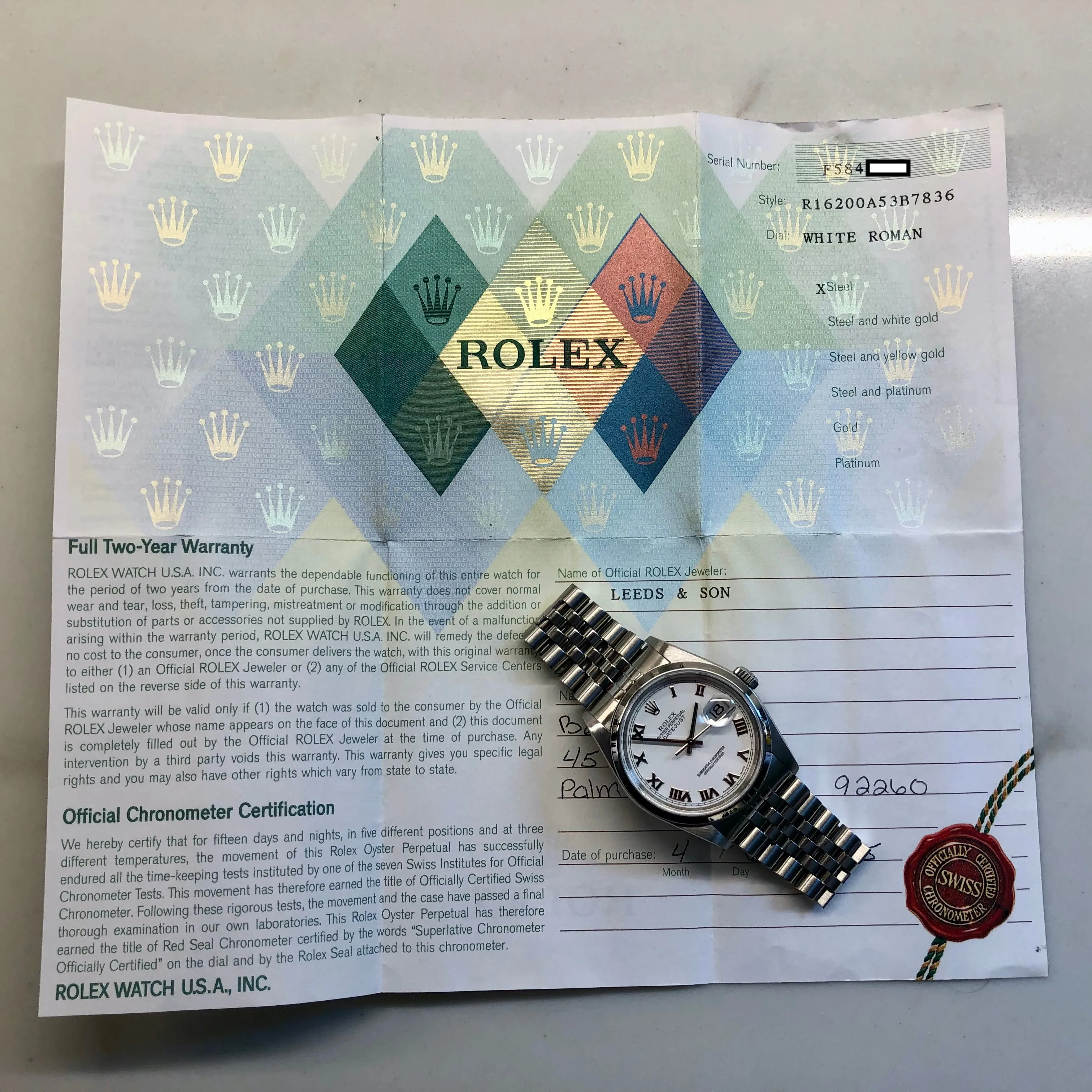 2005 Rolex Datejust 16200 White Roman Dial Jubilee Wristwatch with Papers