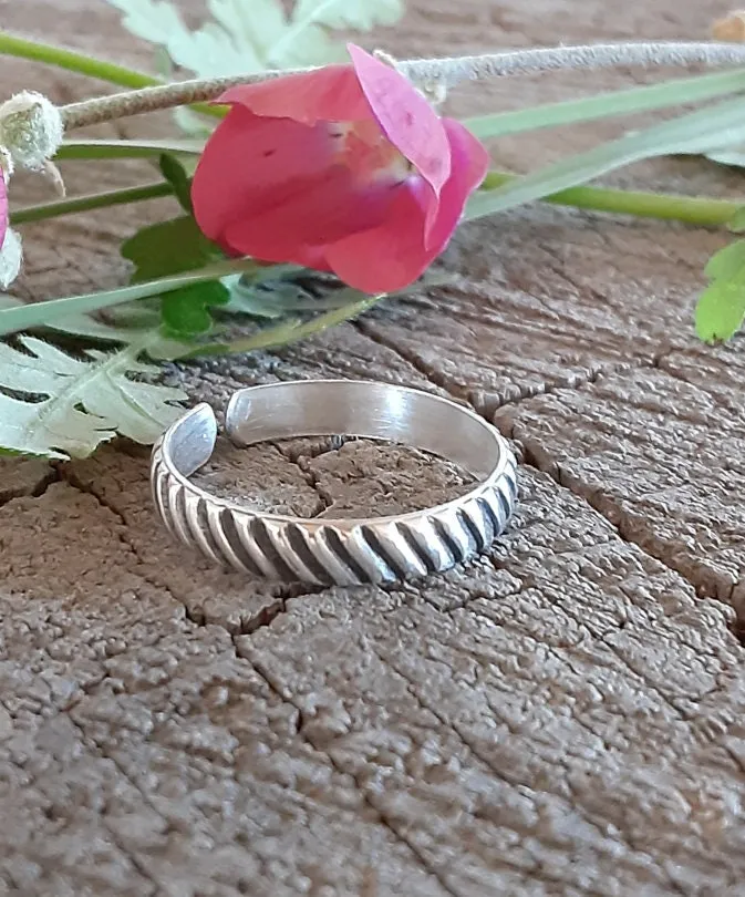 Adjustable sterling silver thumb ring or finger ring