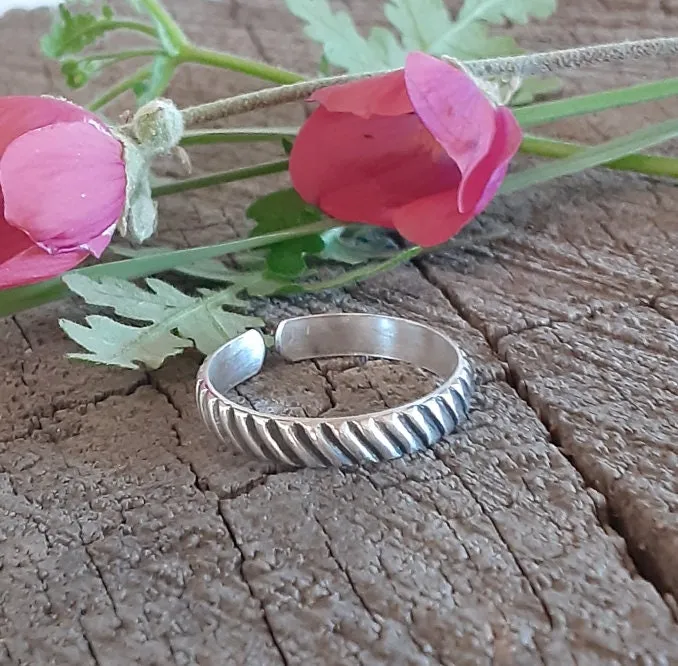 Adjustable sterling silver thumb ring or finger ring