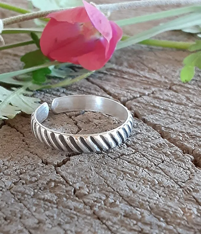 Adjustable sterling silver thumb ring or finger ring