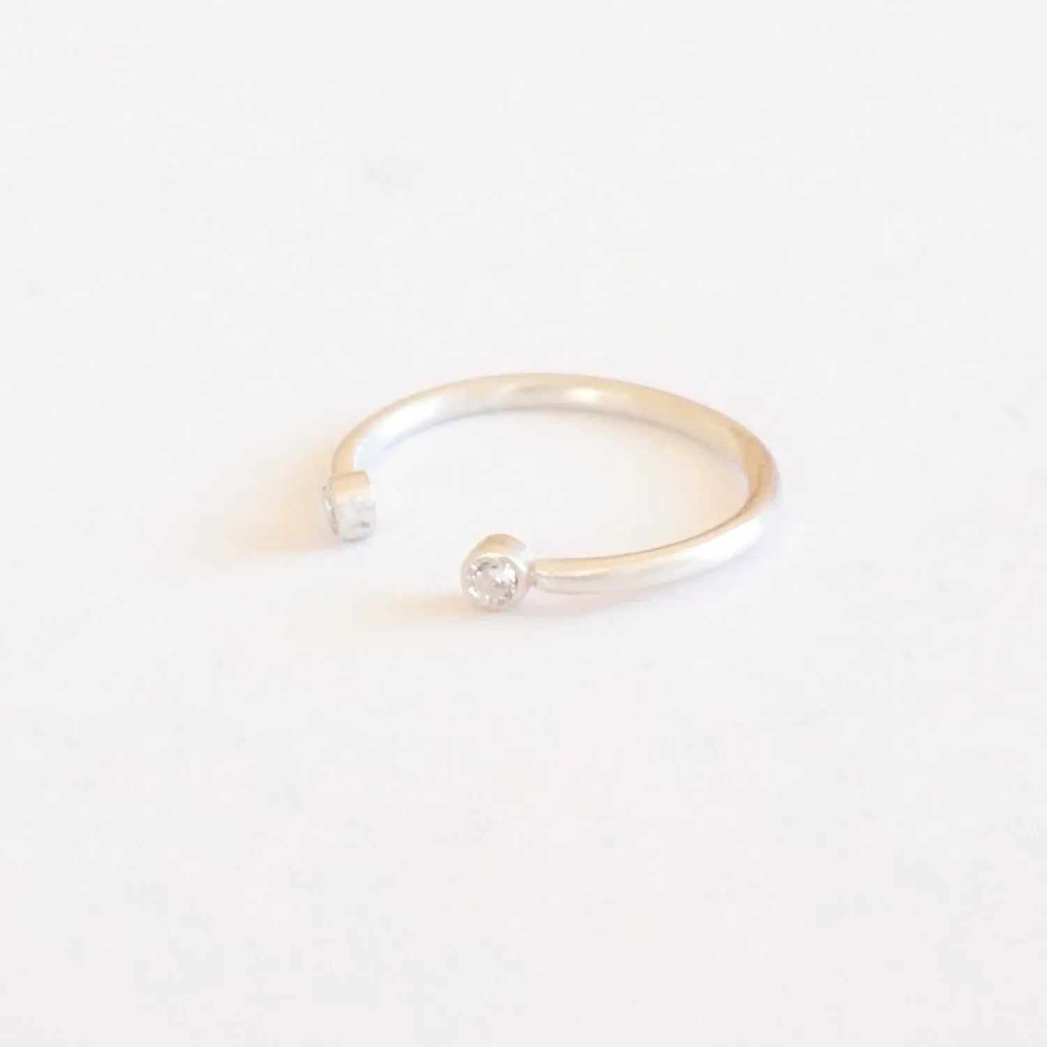 Diastinctively Styled Hand-Made Solid  Open Adjustable Ring With Two Bezel Set Clear CZ's - 0194