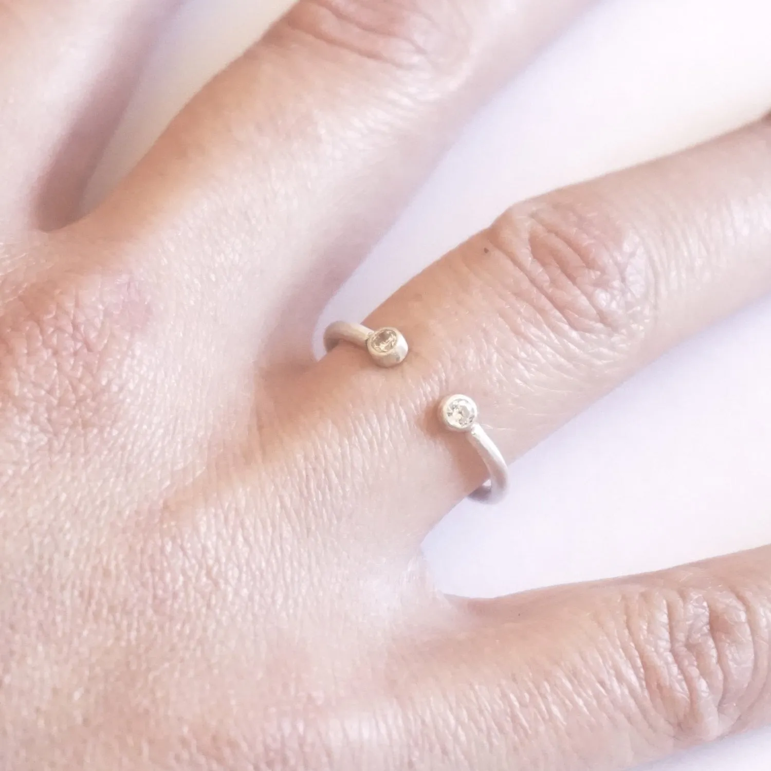 Diastinctively Styled Hand-Made Solid  Open Adjustable Ring With Two Bezel Set Clear CZ's - 0194