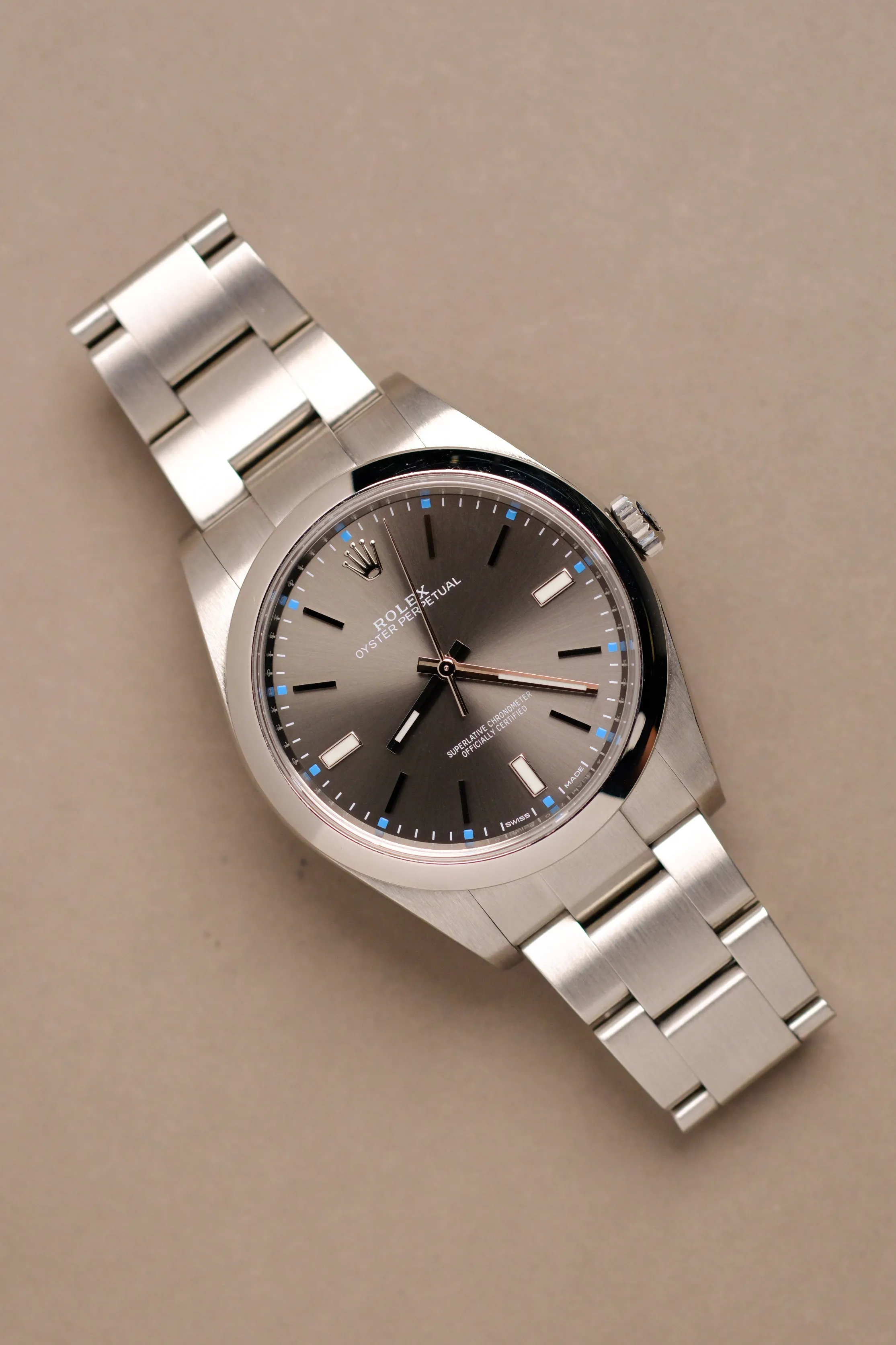 Rolex Oyster Perpetual 114300 Rhodium Dial