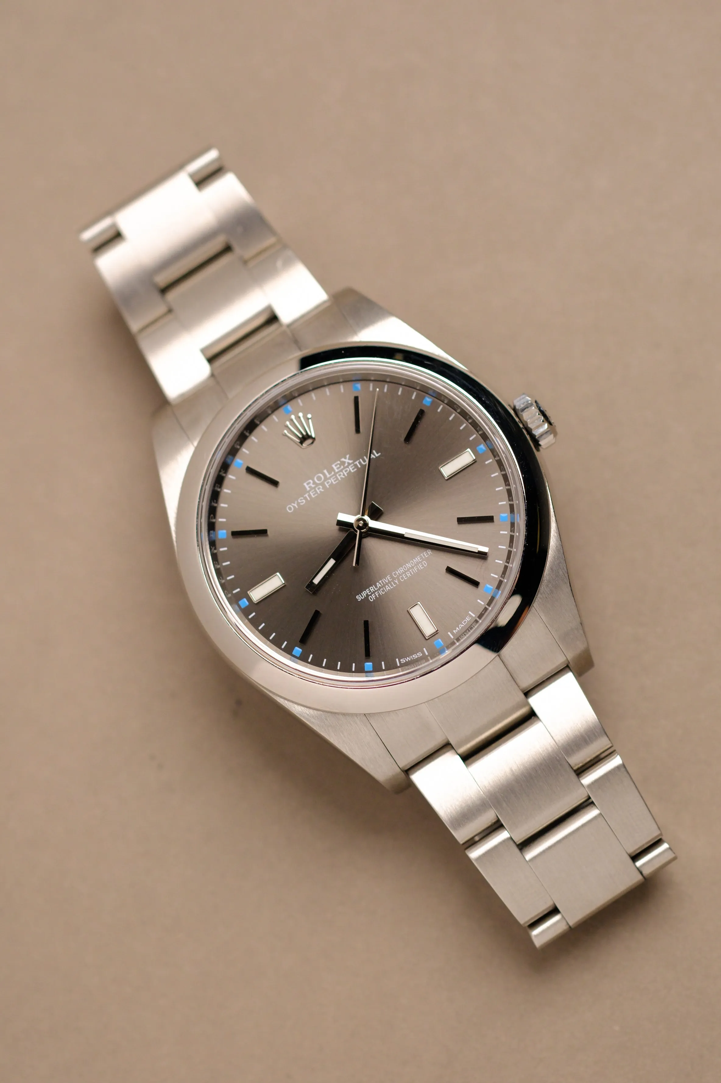 Rolex Oyster Perpetual 114300 Rhodium Dial
