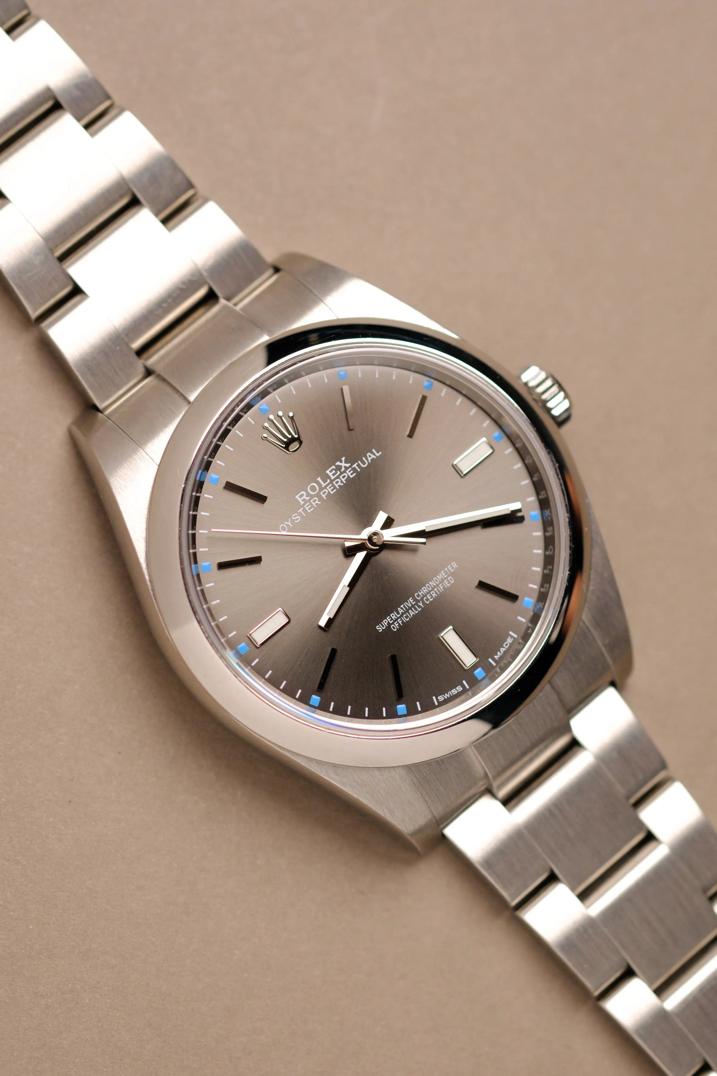Rolex Oyster Perpetual 114300 Rhodium Dial