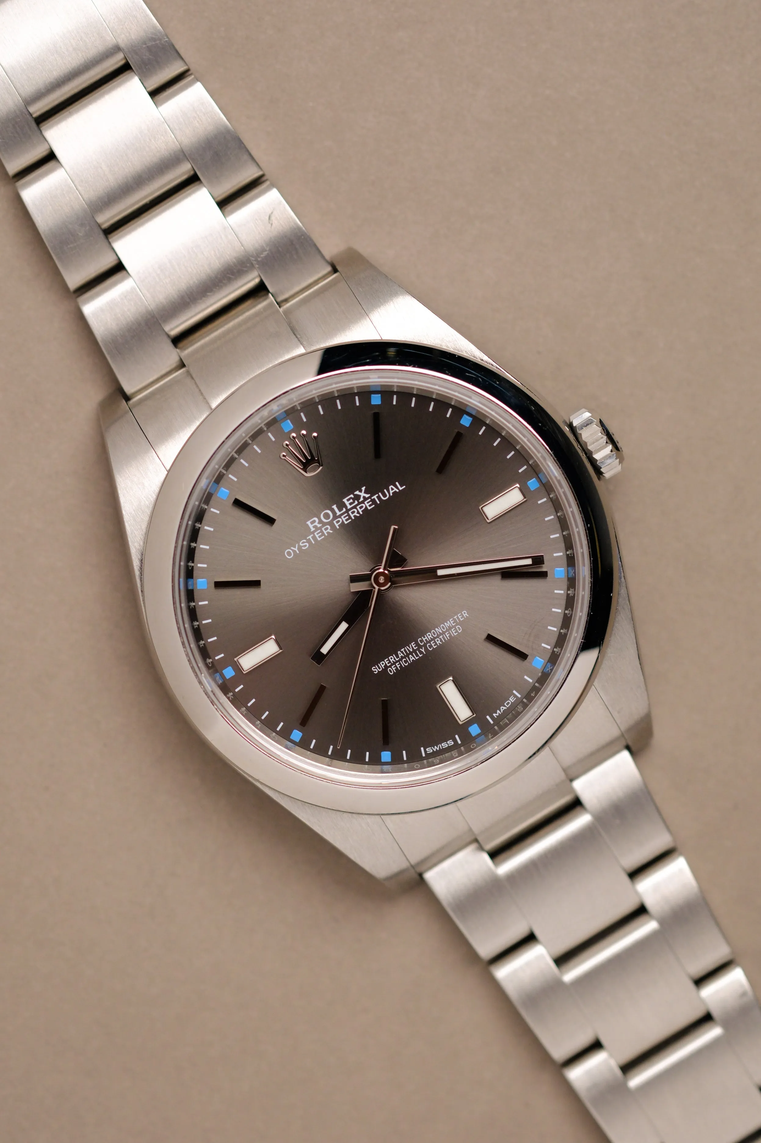 Rolex Oyster Perpetual 114300 Rhodium Dial
