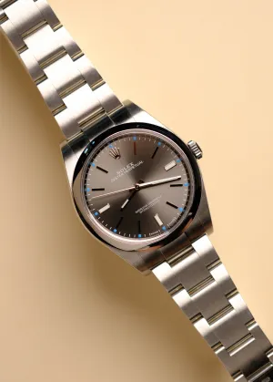 Rolex Oyster Perpetual 114300 Rhodium Dial