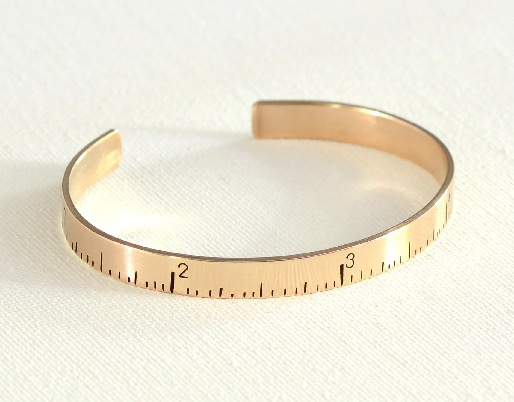 Ruler bracelet in bronze