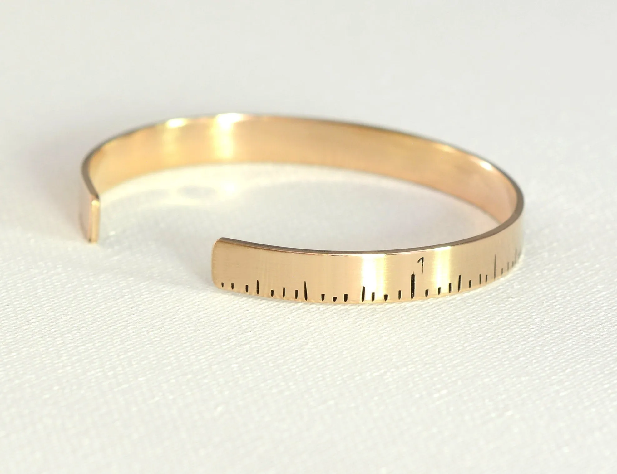Ruler bracelet in bronze