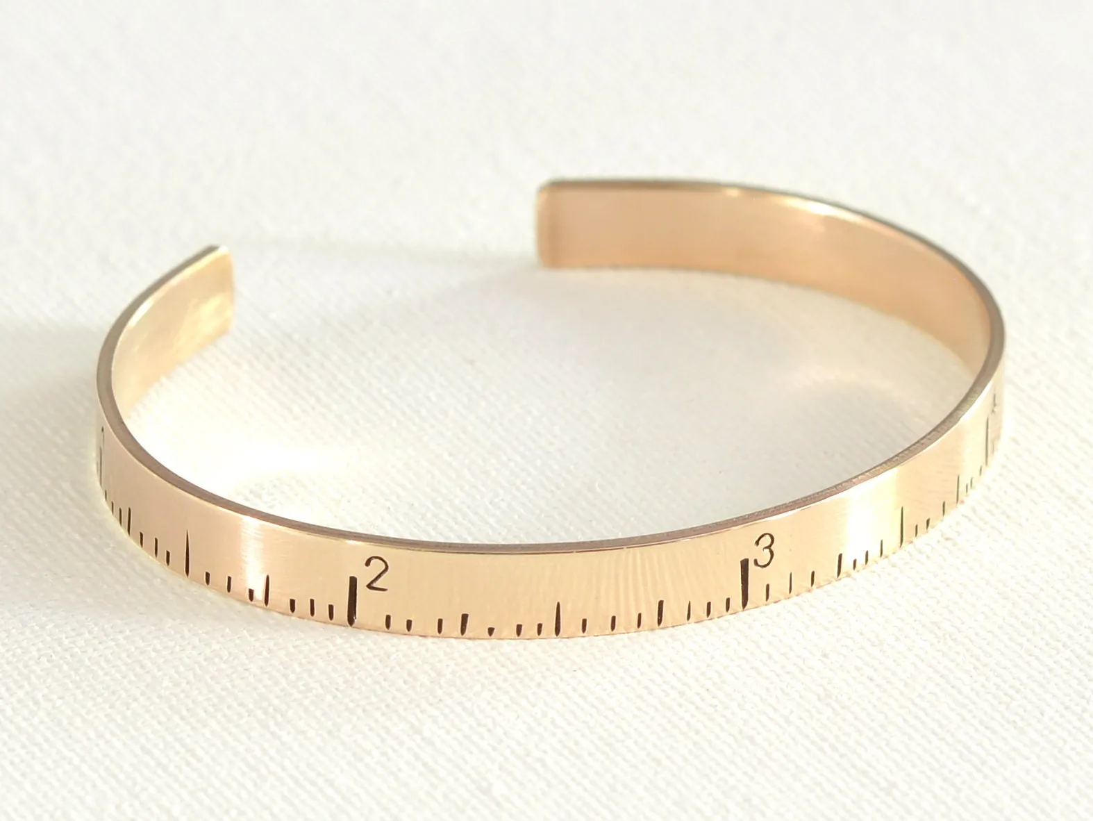Ruler bracelet in bronze