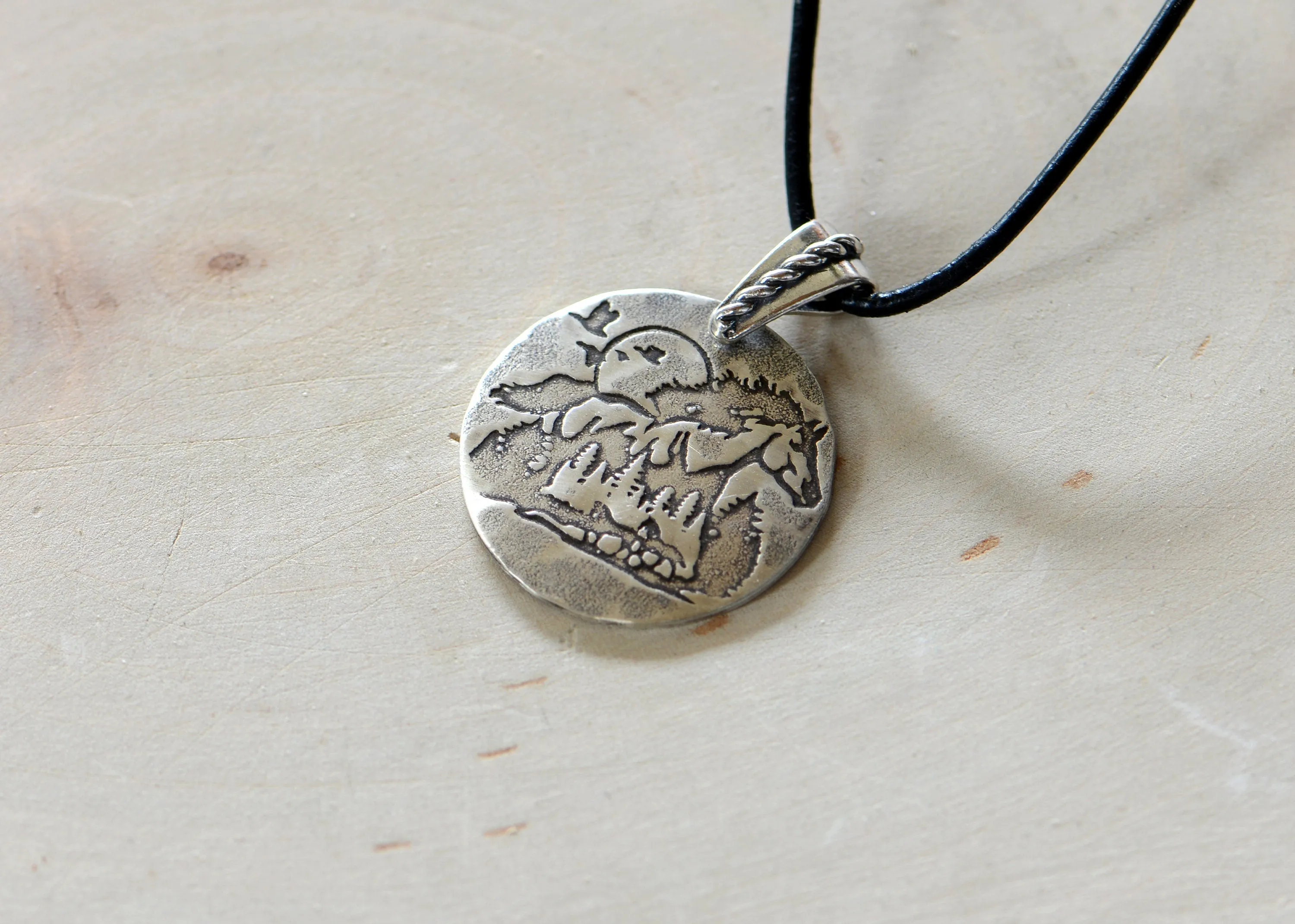Sterling silver horse and moon guitar pick with trees
