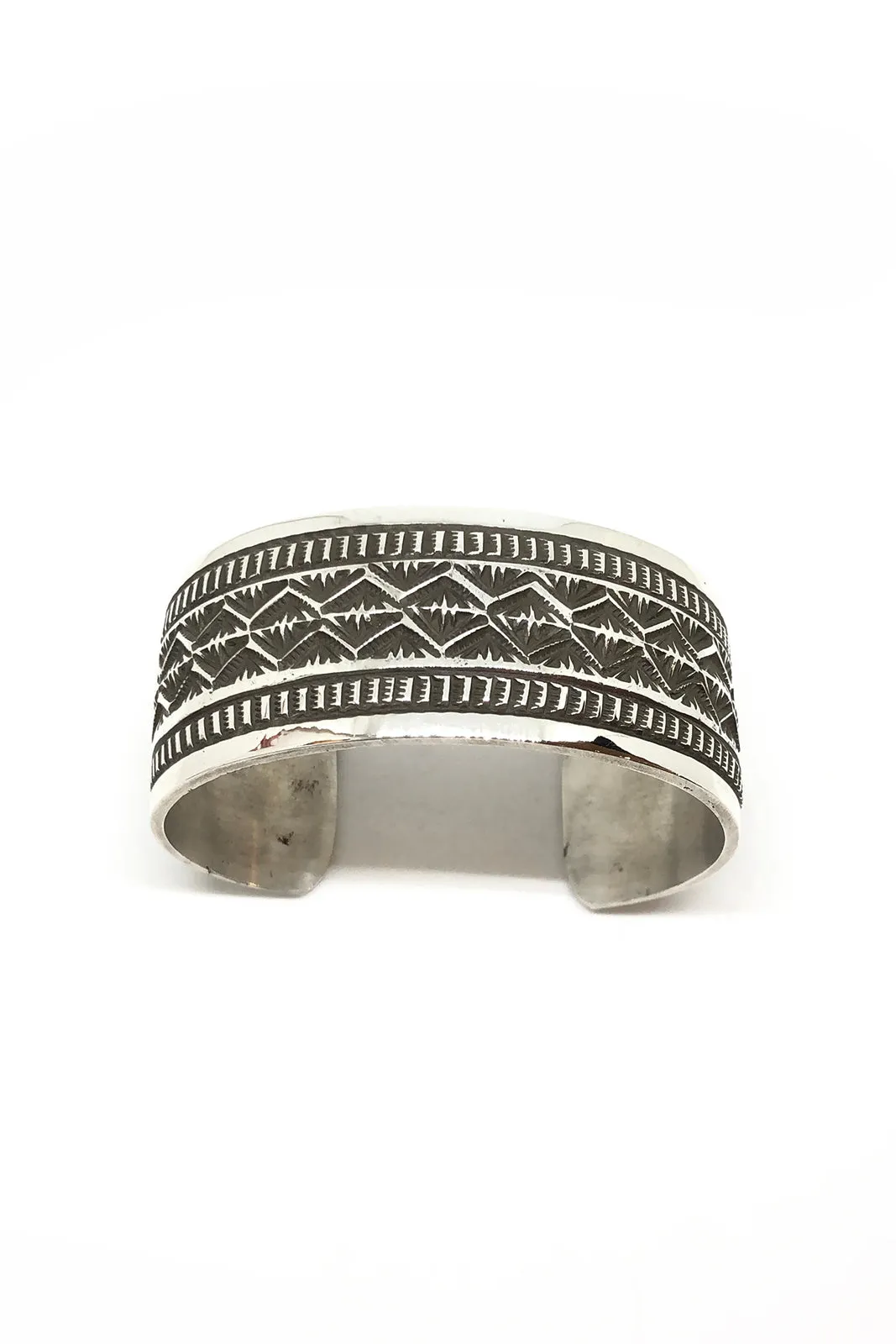Wide Navajo Stamped Sterling Silver Cuff by Leonard Maloney